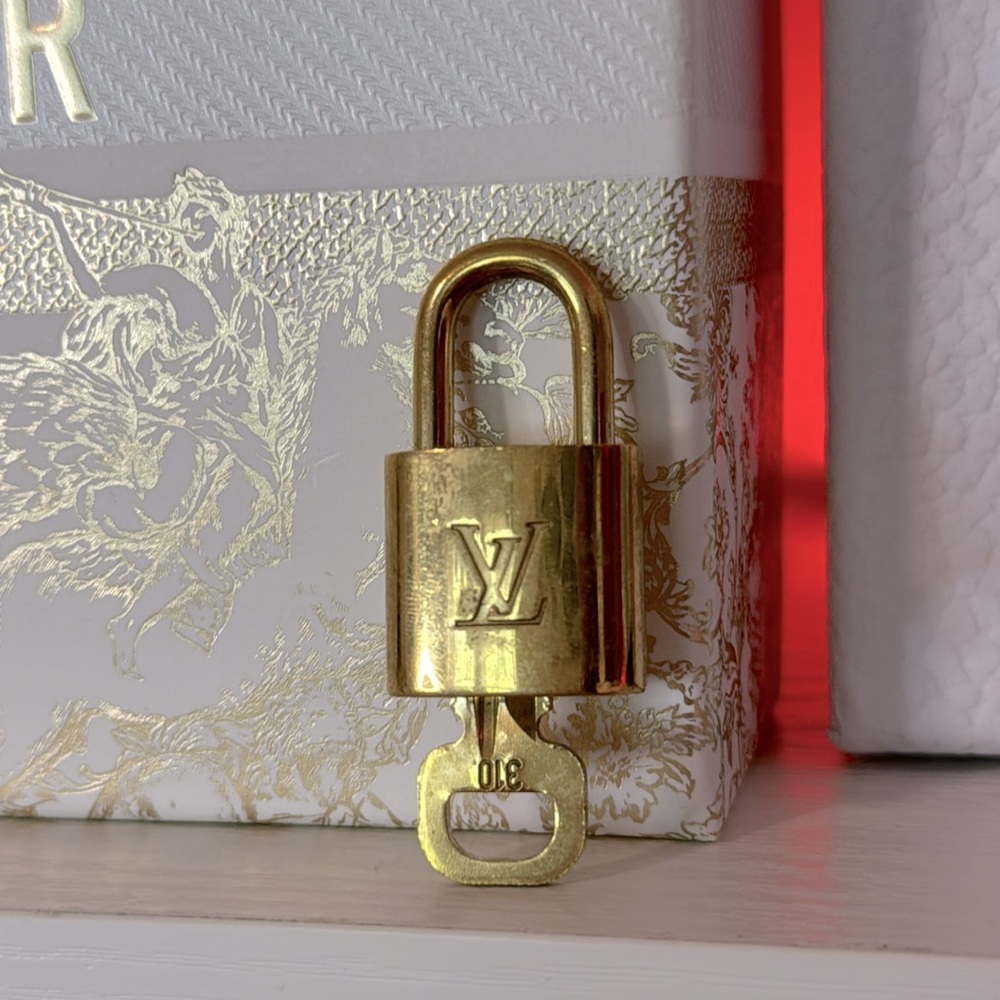 Louis Vuitton lock and key gold 310